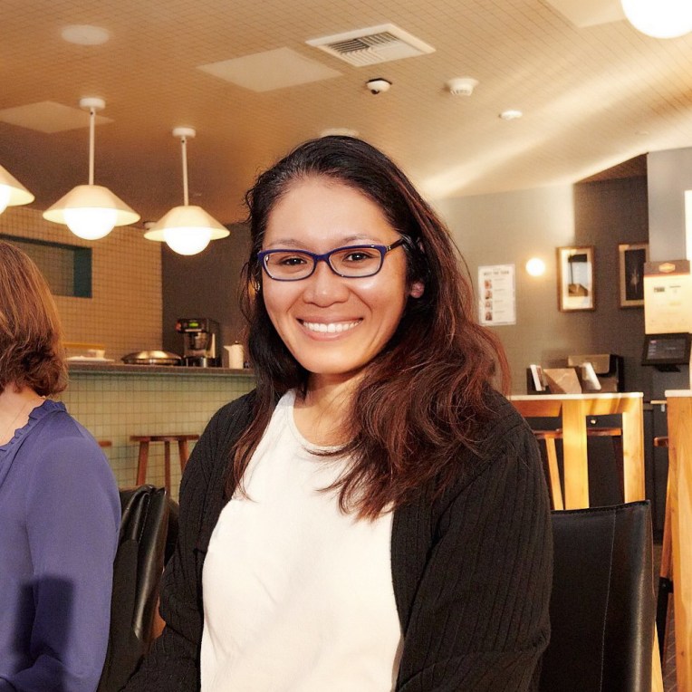 Lana Lee Sitting at a Meetup